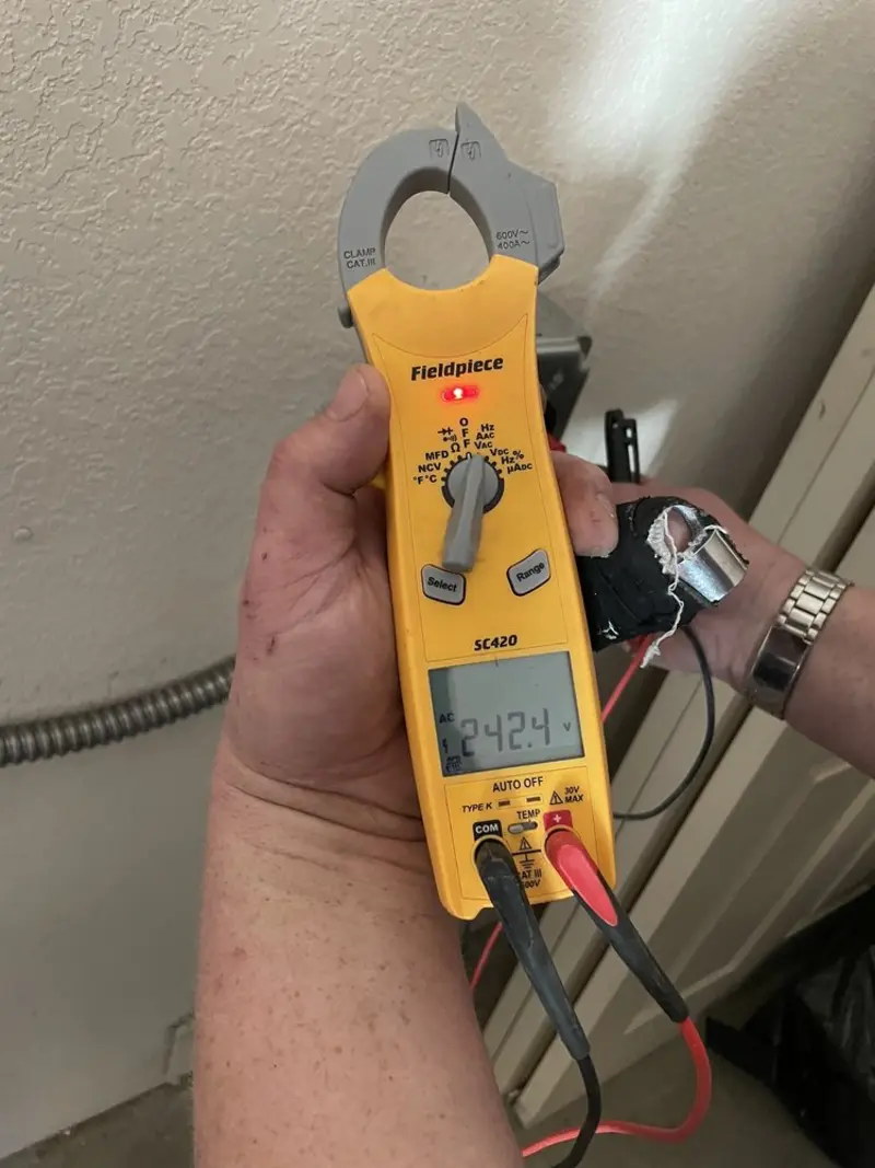 Voltage testing with clamp meter during Electrical Installation Services in Coto de Caza